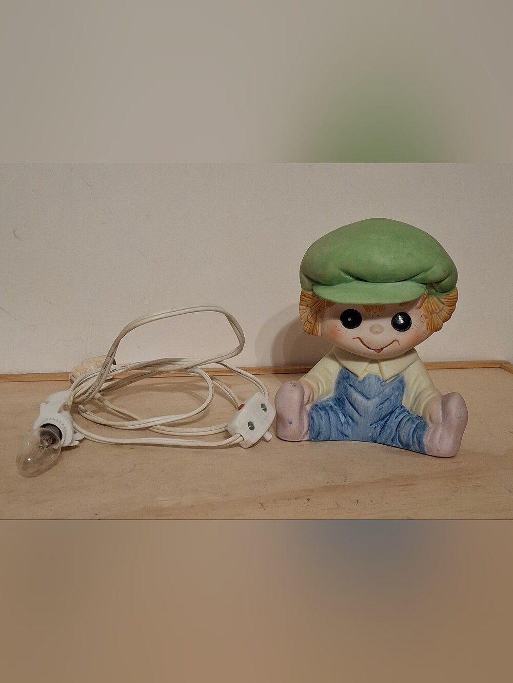 Vintage ceramic Interpur boy night light, green cap, blue overalls, works great
